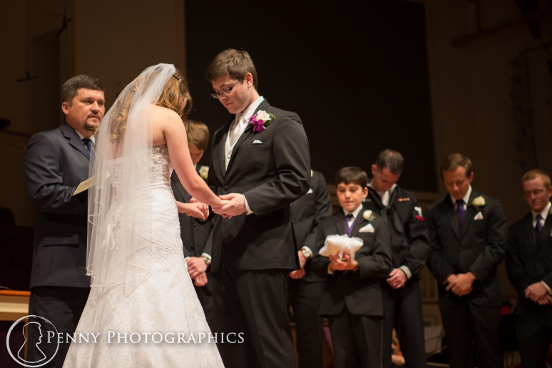 bride and groom praying at wedding