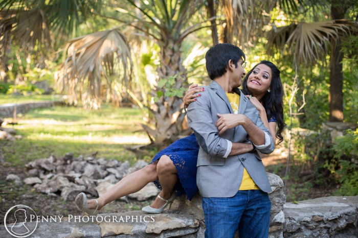 couple having fun during engagement session at Mayfield park