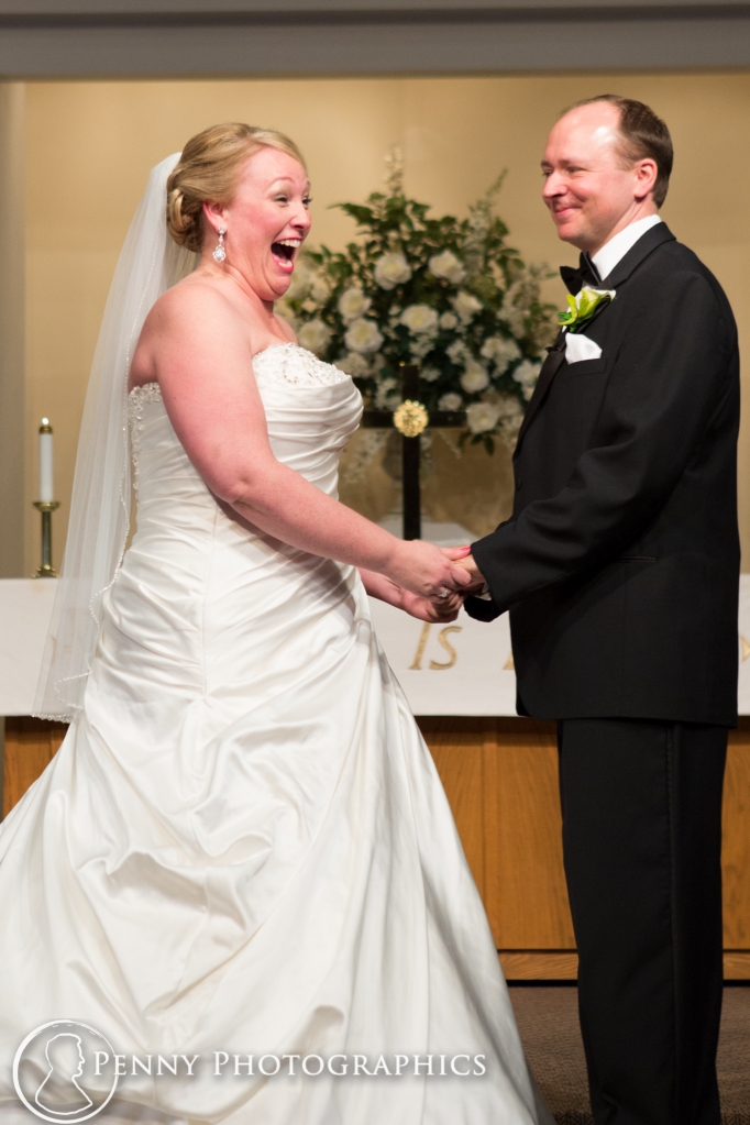 excited bride during ceremony at church wedding MN