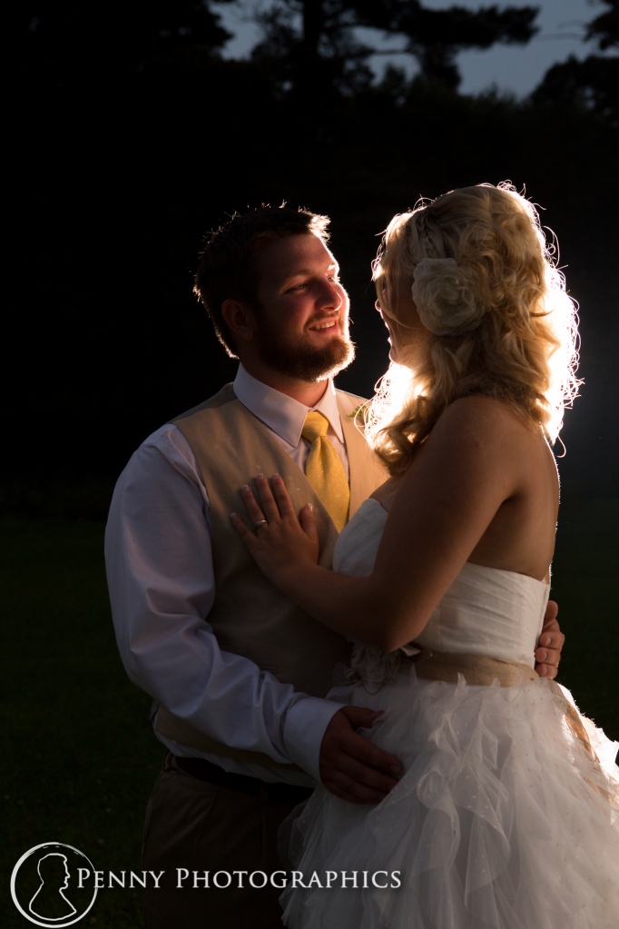 bride and groom at night by Penny Photographics