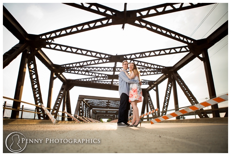 Urban Minneapolis Engagement couple on bridge