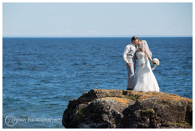 Great Lakes Wedding couple coastline kiss