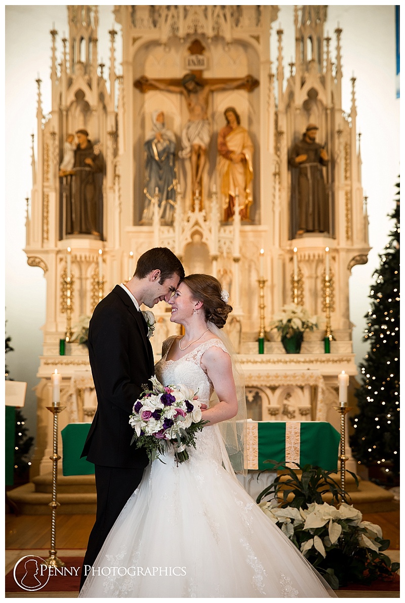 Minnesota Winter Wedding couple smiling in church