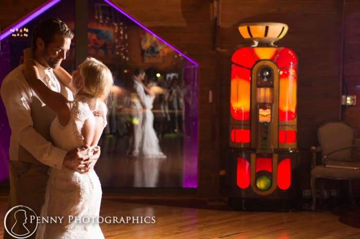 bride-groom-dance-reflection-barn